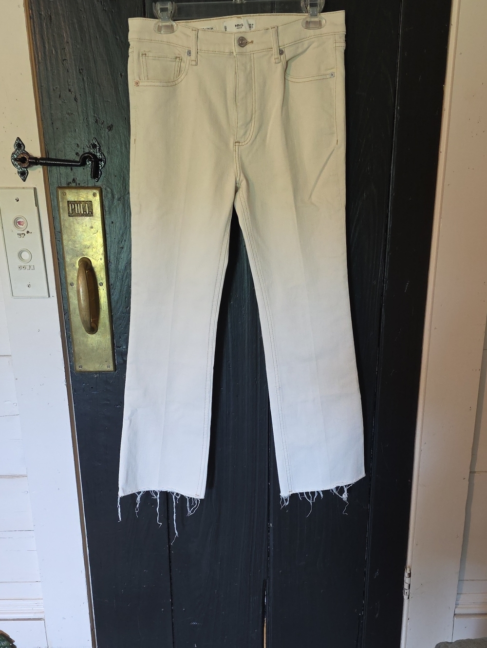 Boot-Cut Raw Hem Jeans in Off-White
